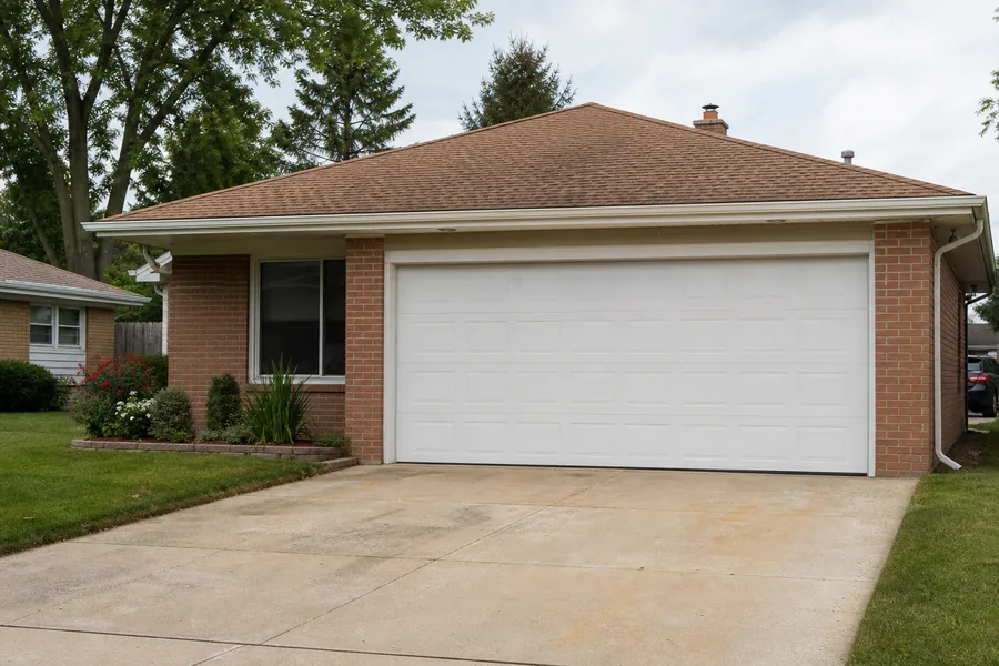 A new sectional garage door installed by OnPoint Pro Doors Denver in Denver, CO